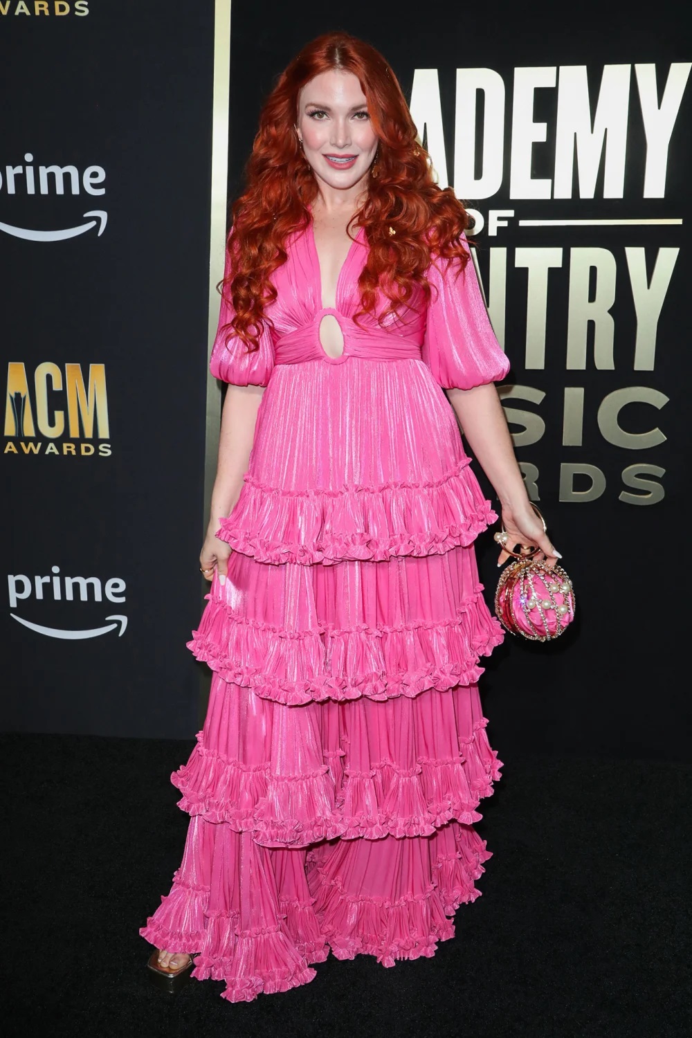 Caylee Hammack looked pretty in a pink pleated dress.